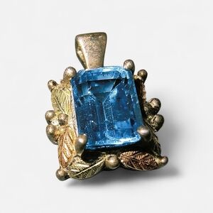 Coleman Black Hills Gold Sterling & 12K Gold Pendant With Blue Topaz Gemstone